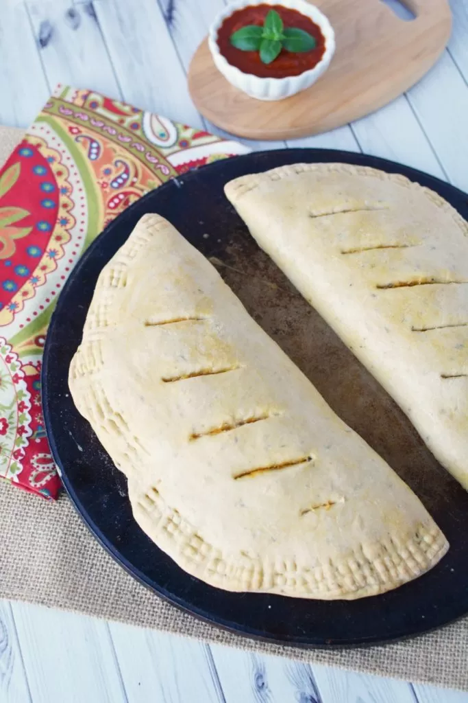 Calzones are a hearty, filling, freezer friendly meal for busy mealtimes