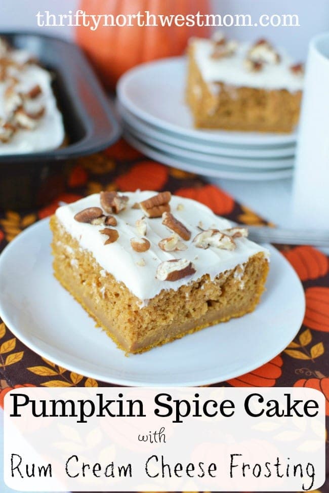 This Pumpkin Spice Cake Recipe with Rum Cream Cheese Frosting is so easy to make for a party and a delicious fall dessert.