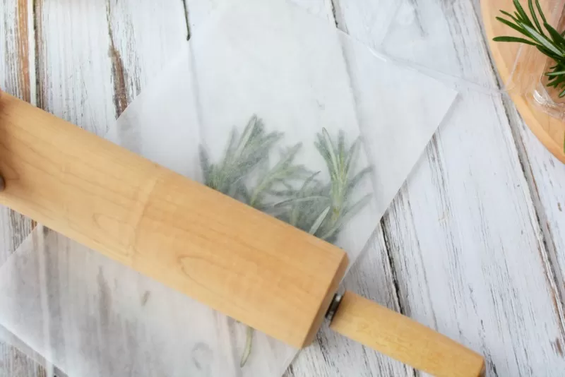 Crushing Rosemary for Rosemary Infused Olive Oil