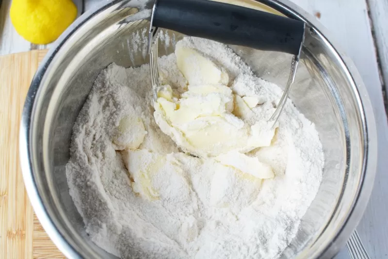 Adding butter to Blueberry Coffee Cake recipe