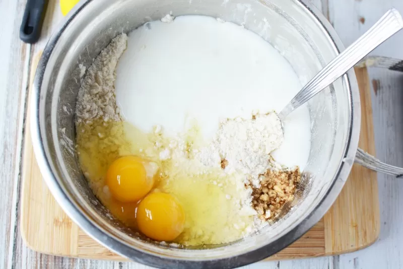 Adding eggs and more to Blueberry Coffee Cake Recipe