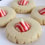 These Peppermint Kiss Cookies are so easy yet so festive & fun for a Christmas holiday party.