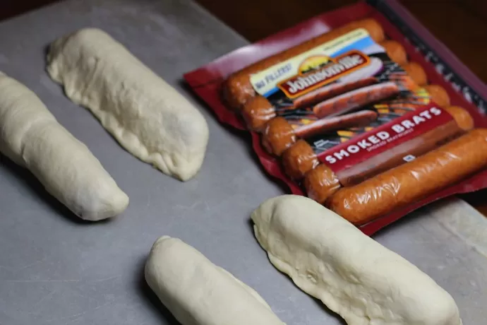 putting-together-cheese-sausage-rolls