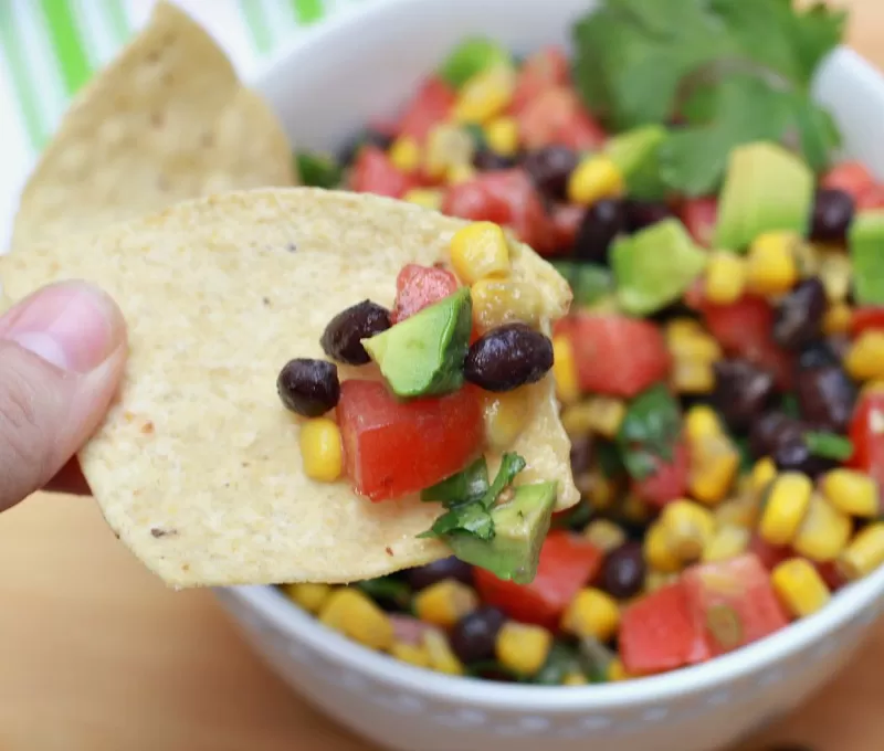 Corn and Black Bean Salsa with Tortilla Chips are a healthy, filling appetizer for parties