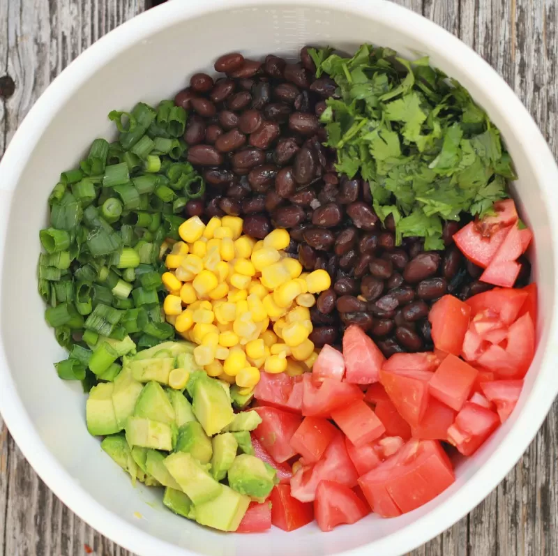 Making Corn and Black Bean Salsa for a party