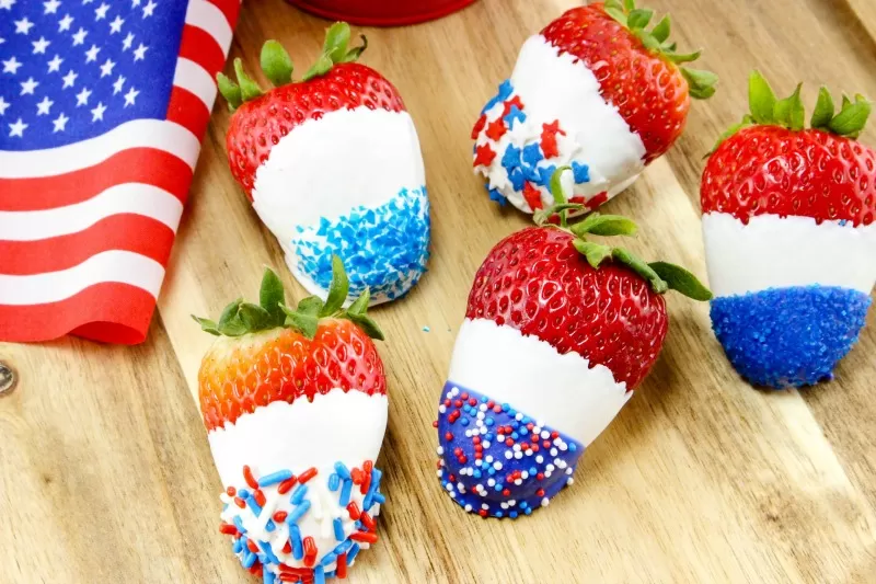 Patriotic White Chocolate Covered Strawberries are sure to be a hit at any 4th of July party