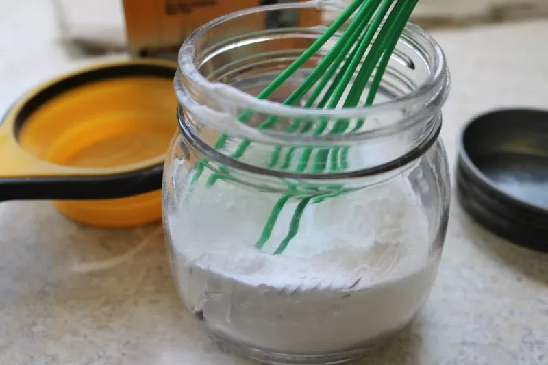 Mixing ingredients for Homemade Grout Cleaner