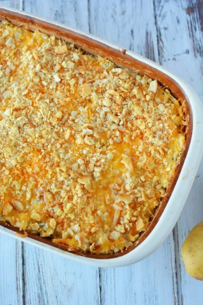 This is an easy recipe for cheesy hashbrown potatoes sure to be a hit at any gathering