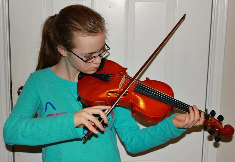 Trying out violin from ShopGoodwill.com site