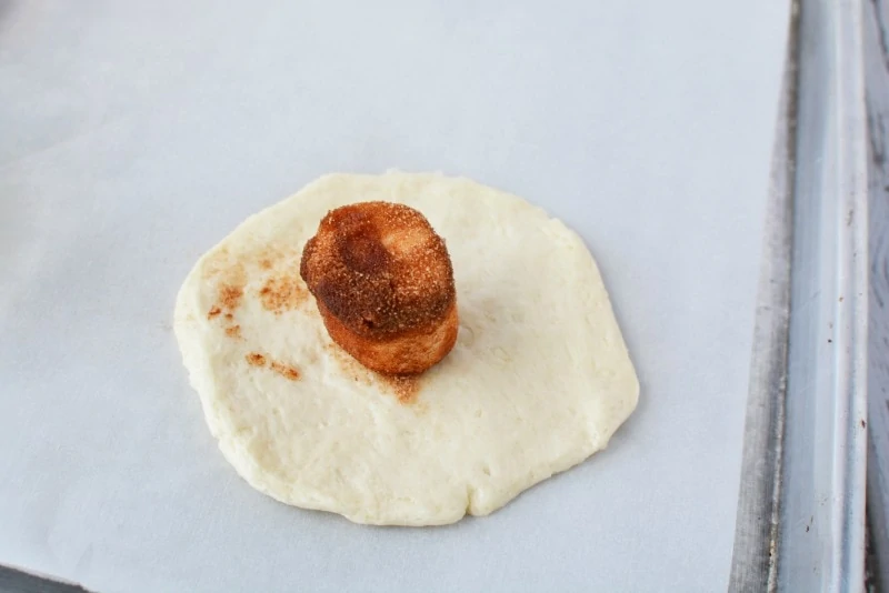 Placing Marshmallow on dough for Empty Tomb Rolls