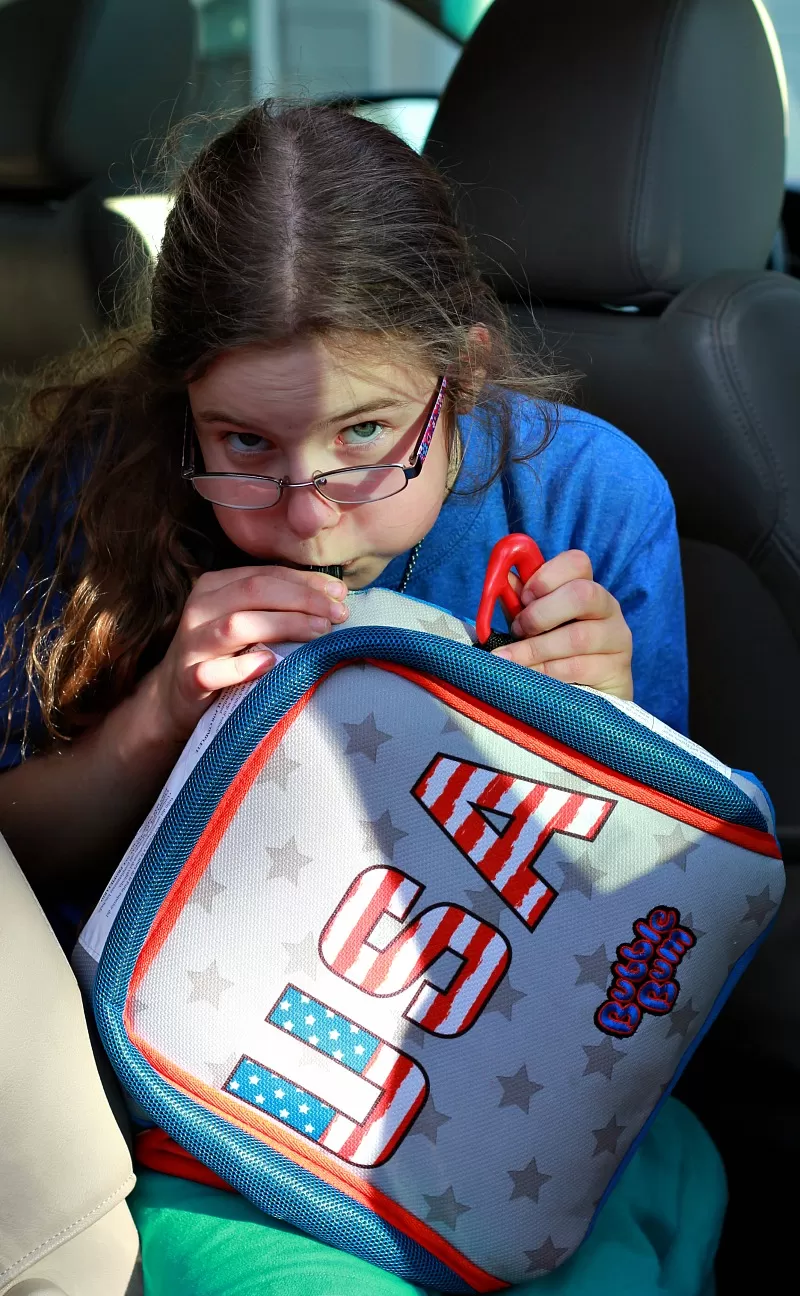 Kids can even blow the Bubble Bum Travel Booster Seat up - it's so easy to use