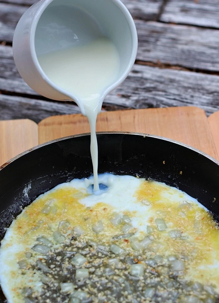 Adding Milk to Tuscan Shrimp Scampi