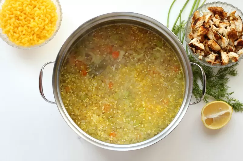 Making chicken noodle soup with noodles & chicken