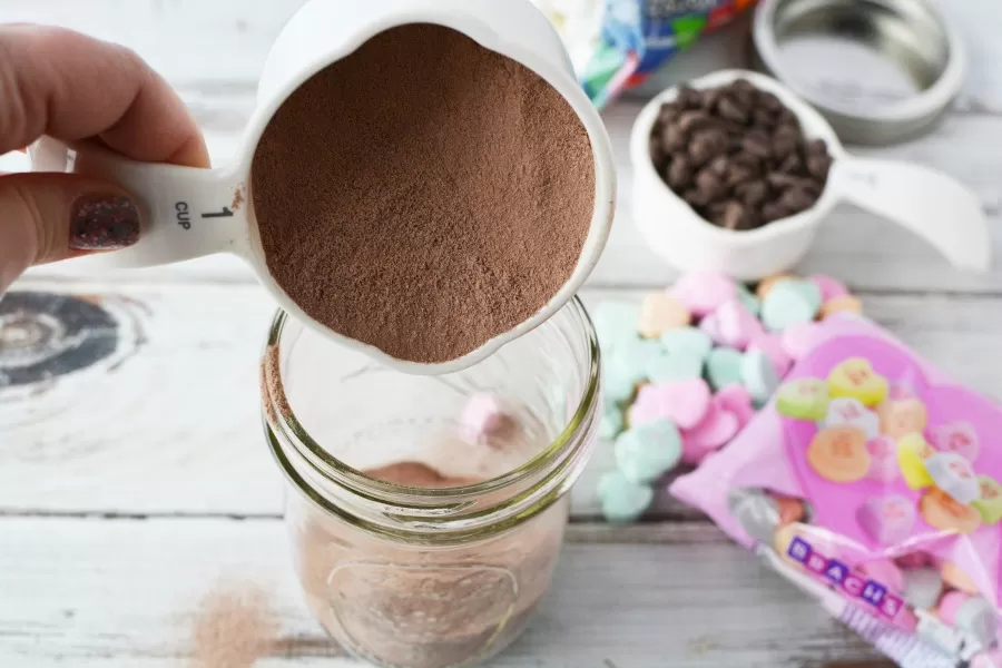 Hot Cocoa being poured into Jar for Valentine Hot Cocoa
