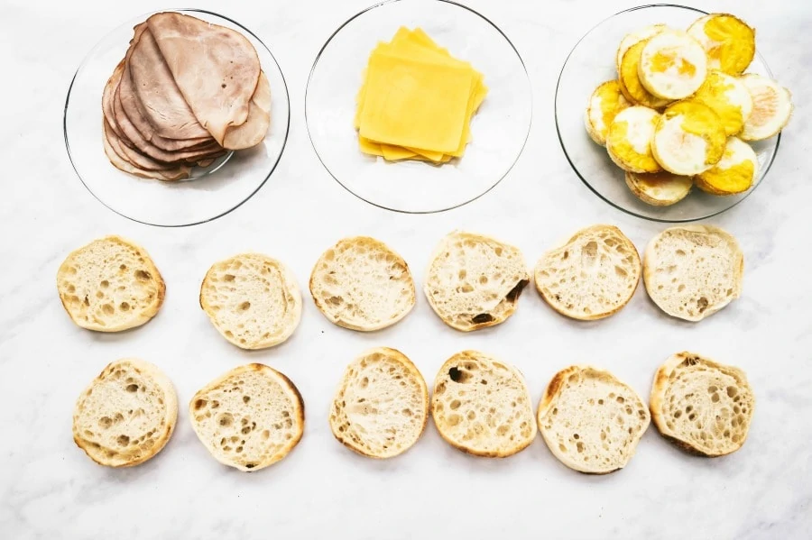 Assembly line for making Breakfast Egg Muffin Sandwiches