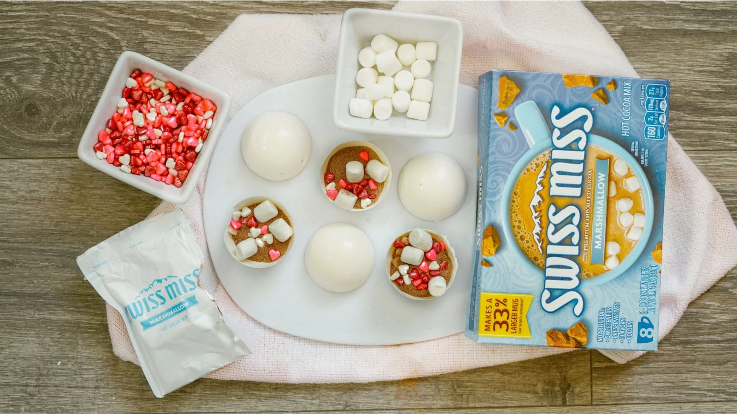 Filling the inside of hot chocolate bombs