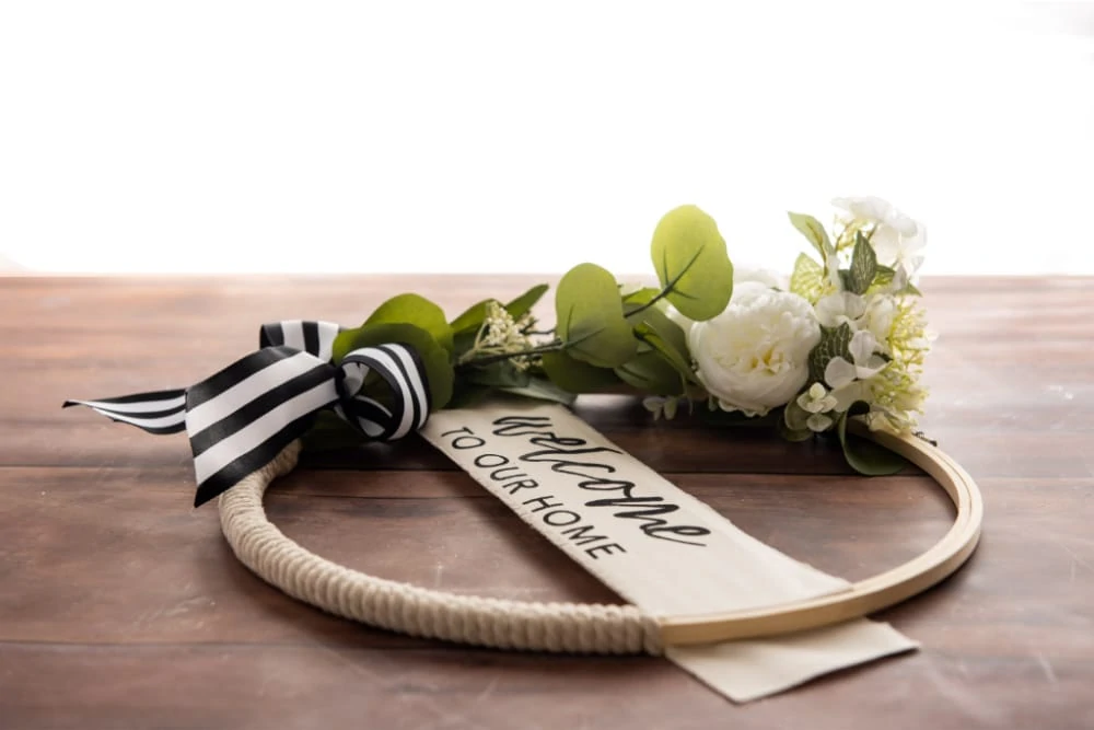 Eucalyptus Wreath with White Flowers & Welcome Sign