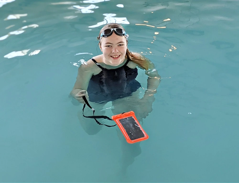 Floating CaliCase in the Pool with girl