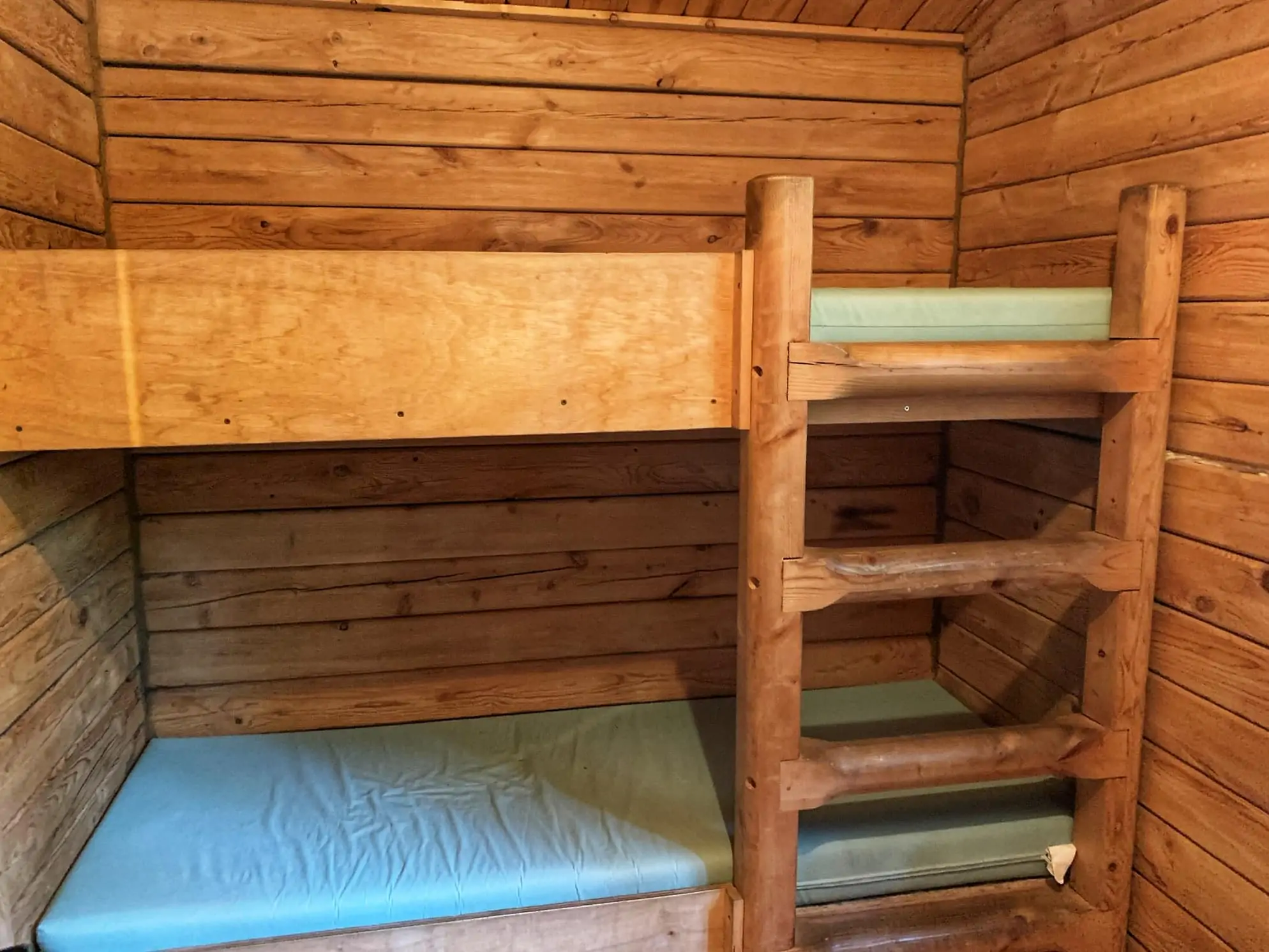 bunk beds in rustic cabin