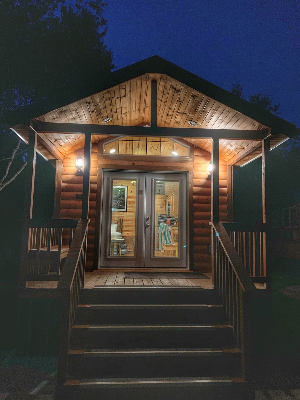 cabins lit up in the evening