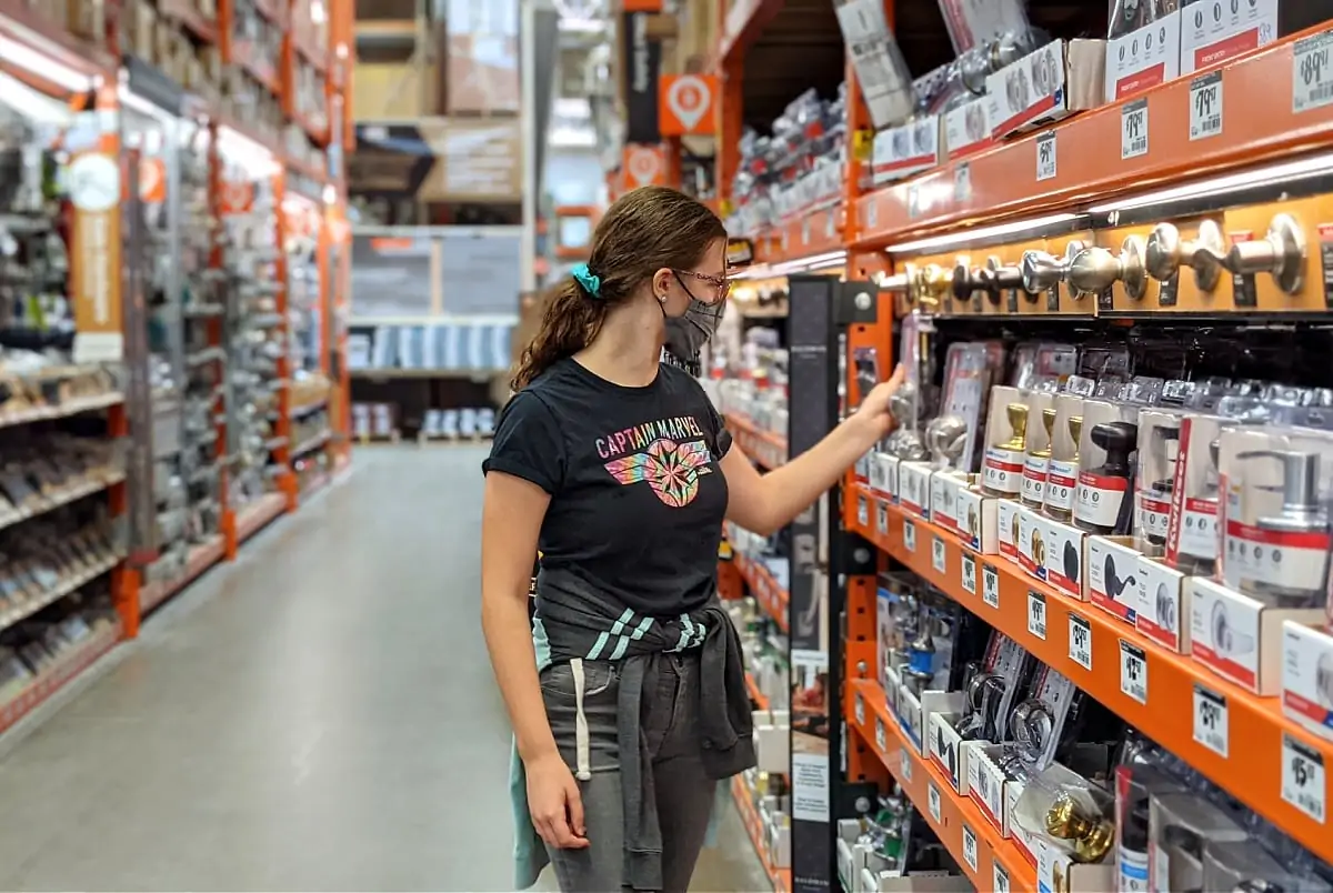 Looking at door locks at the hardware store