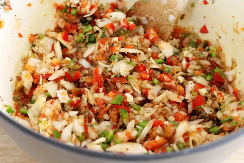 Mixing ingredients for Spaghetti Sauce