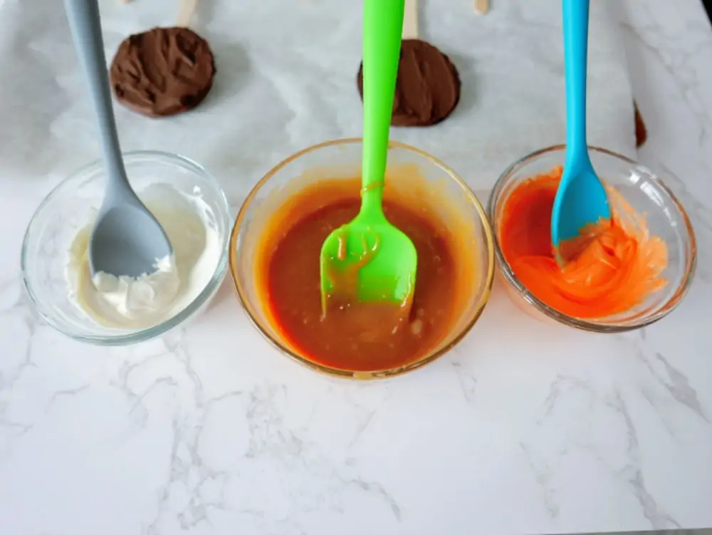 Preparing icing & caramel for caramel apple pops