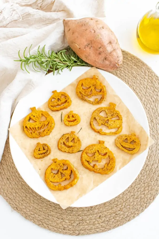 Sweet potato fries on plate with potato herbs & oil (1)