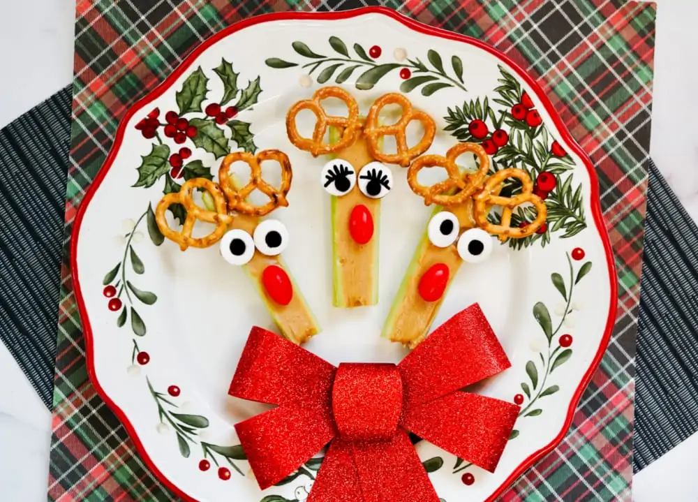 Rudolph celery snack on a plate with red bow
