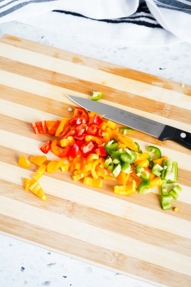 Chopping peppers for chicken lettuce wraps