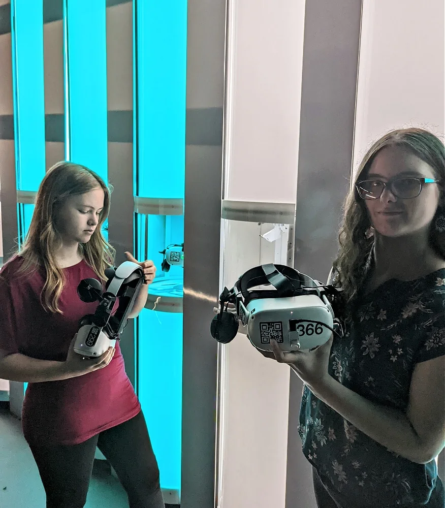 Trying on VR headsets at the Infinite Tour
