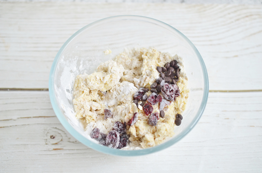 Mixing chocolate chips & cranberries for oatmeal cookies