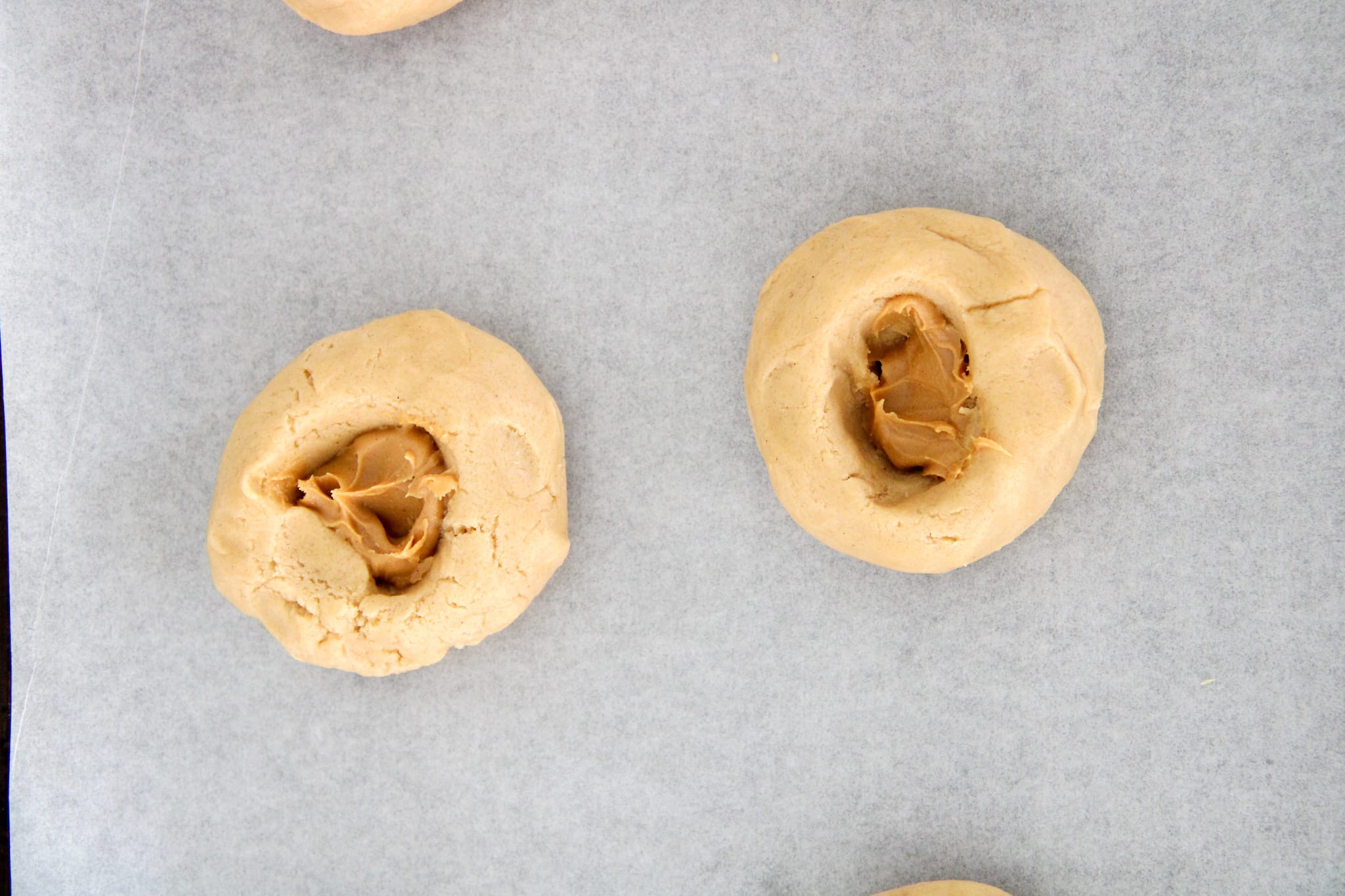 Putting Peanut Butter inside dough
