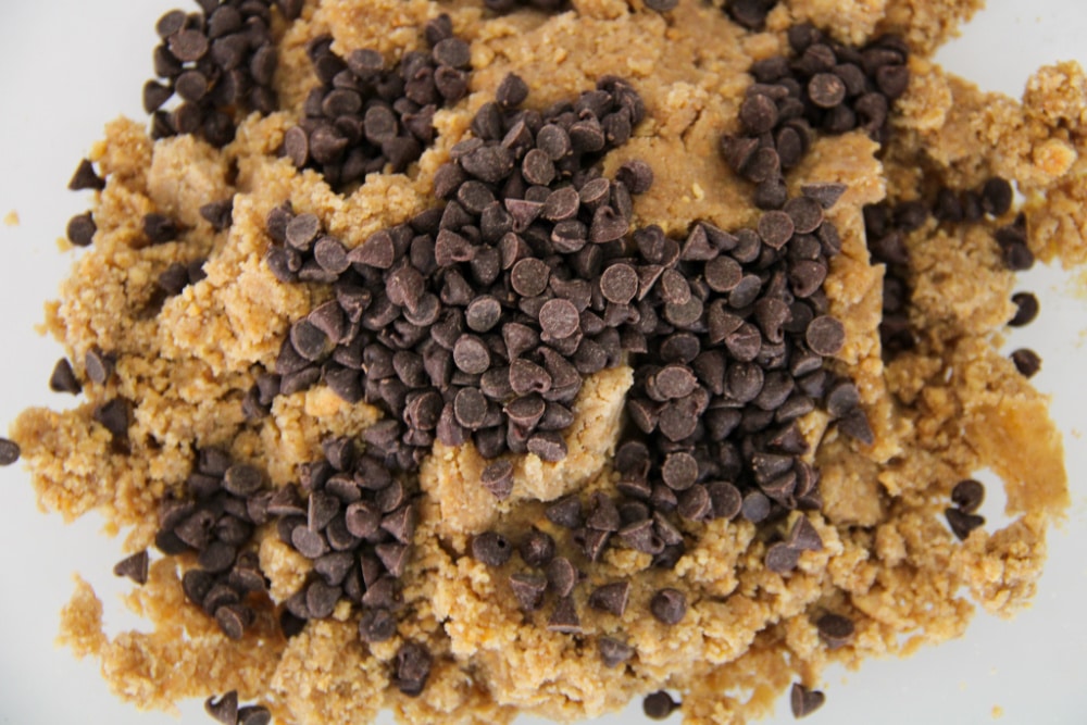 Adding chocolate chips to graham cracker cookies