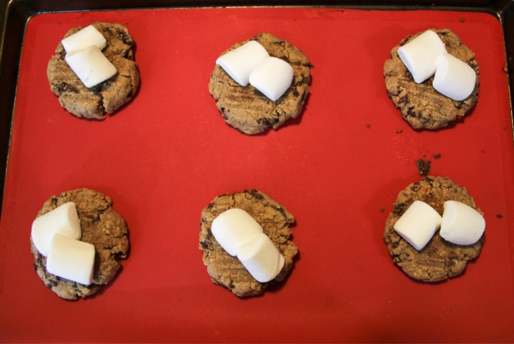 Adding marshmallows to smores crumbl cookies