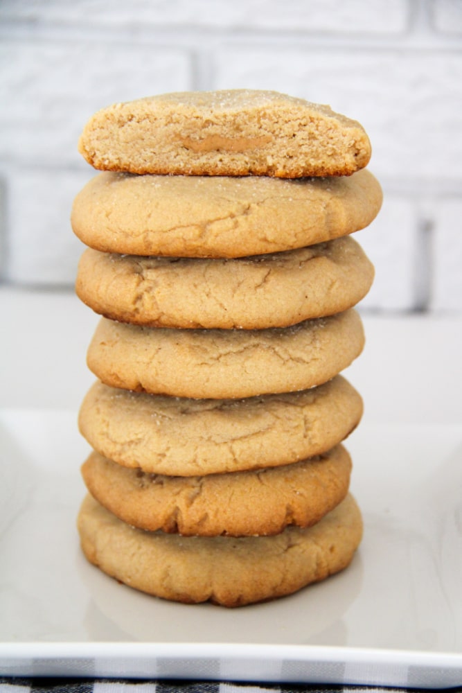 Stack of peanut butter crumbl cookies on a plate