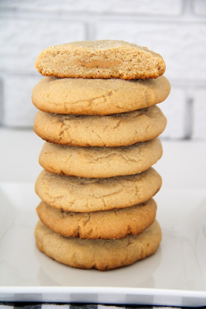 Stack of peanut butter crumbl cookies on a plate