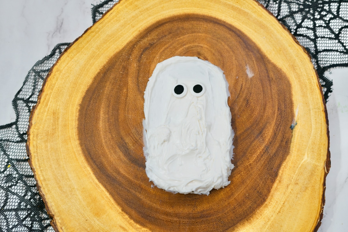 Adding eyes to ghost frosting board
