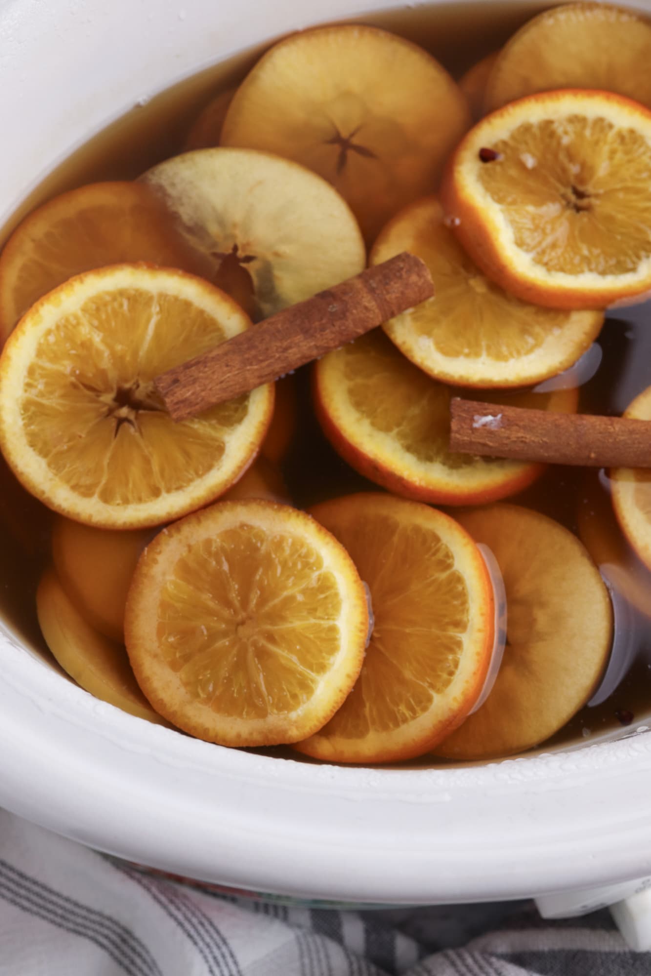 Close up of slow cooker apple cider