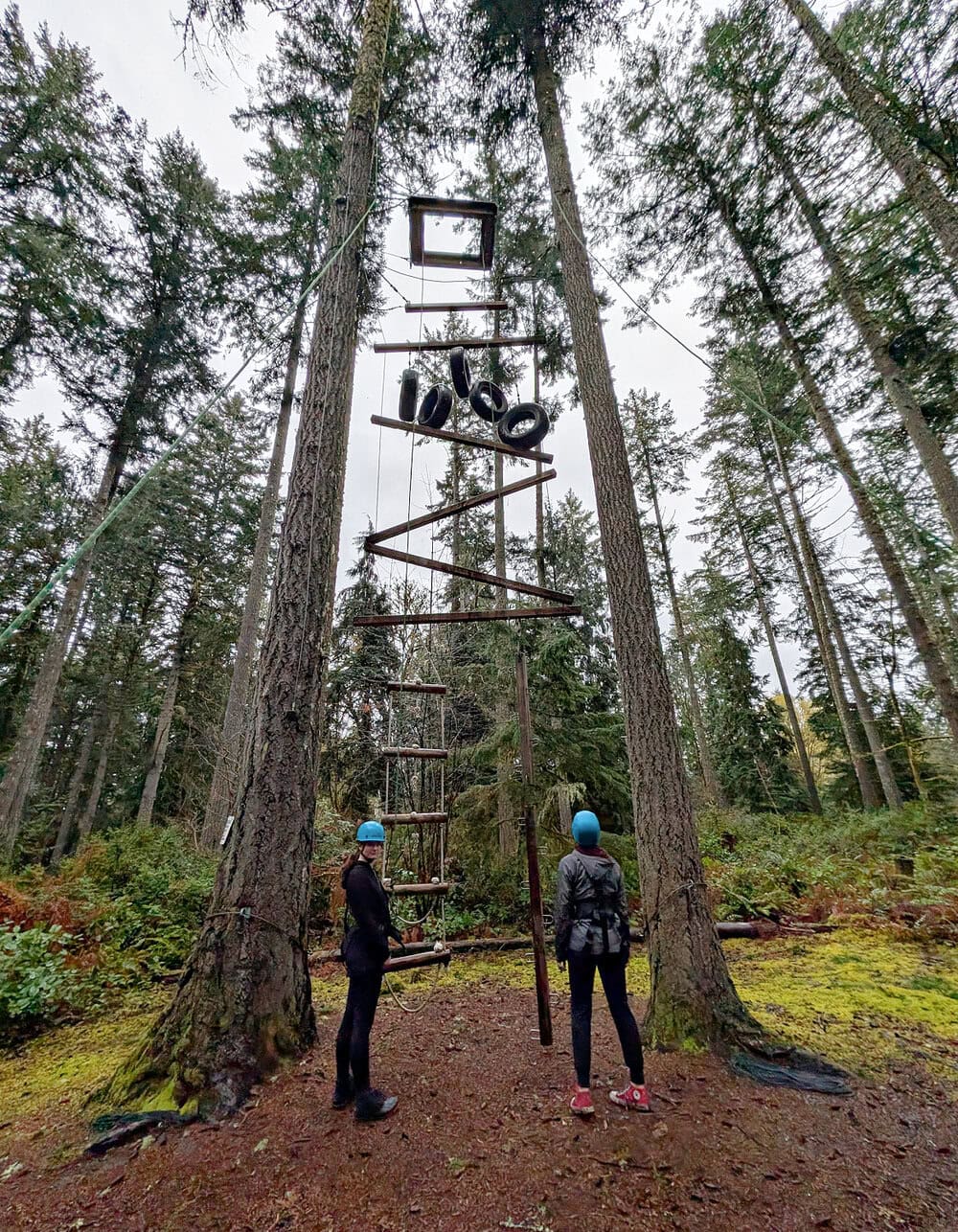 Standing in front of Vertical Playpen at Camp Colman